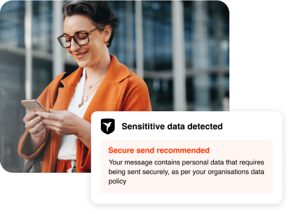 Woman using phone with sensitive data detected UI shot